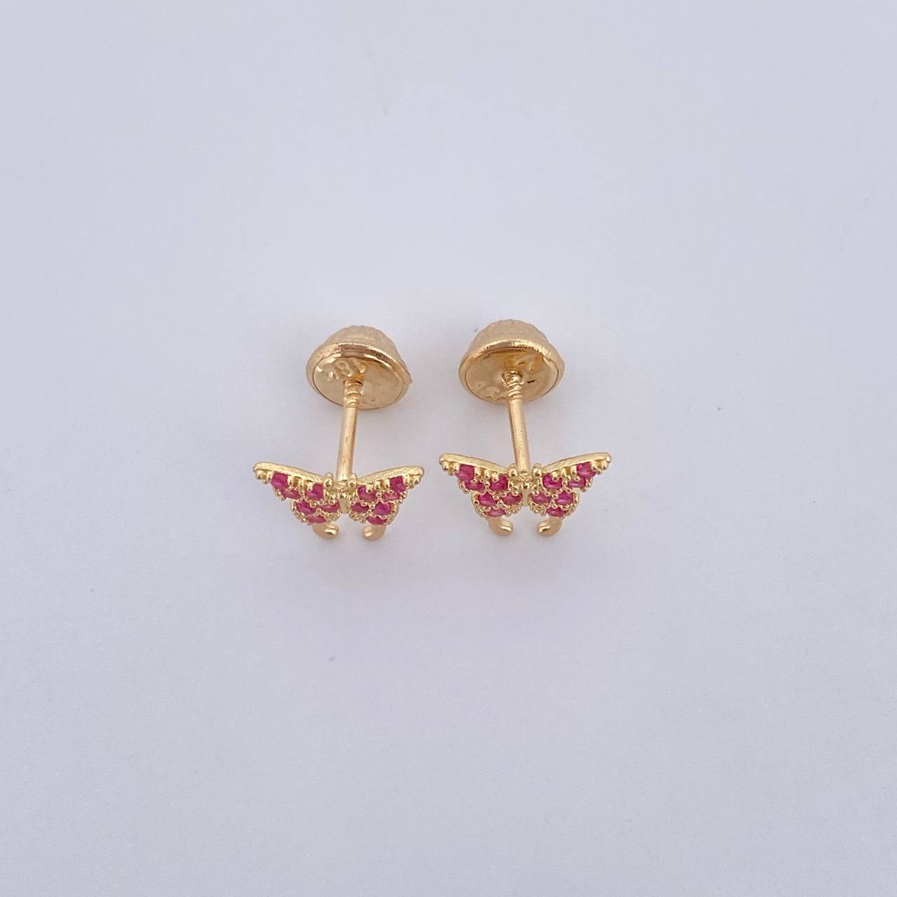 Topos Mariposa 0.85gr / Circones Fucsias Oro Amarillo 18K $