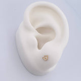 Topos Corona 0.55gr / Circones Blancos Oro Amarillo 18K $