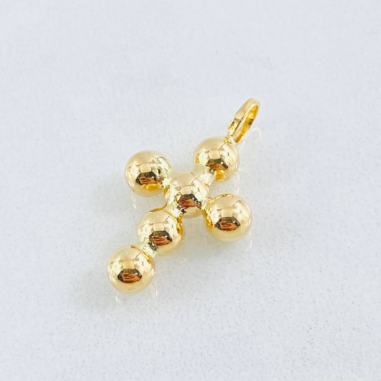 Dije Cruz Esferas Consecutivas 0.7gr / 2cm / Oro Amarillo 18K ©