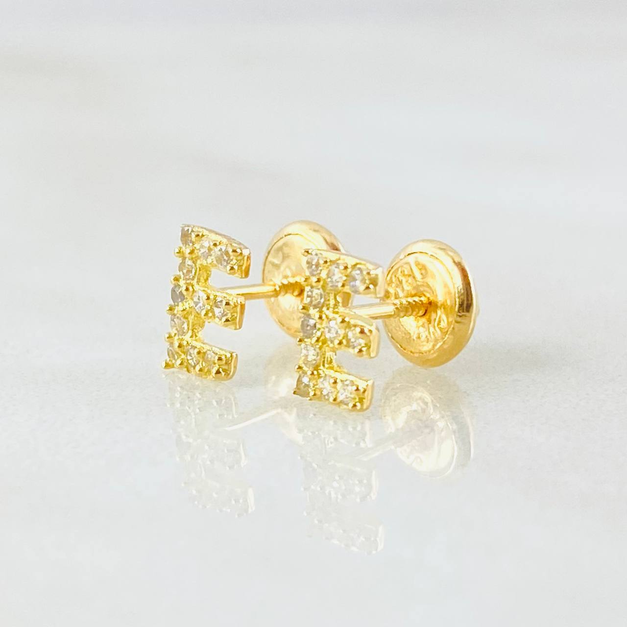 Topos Letra E 0.85gr / Oro Amarillo 18K *