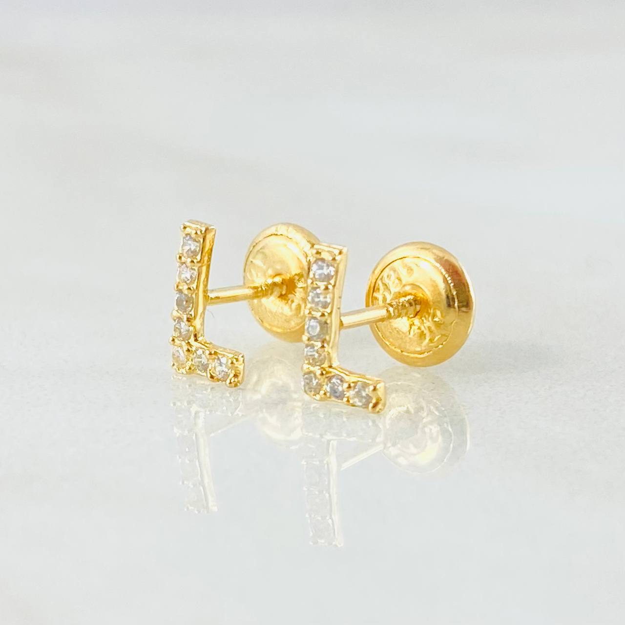 Topos Letra L 0.6gr / Oro Amarillo 18K *