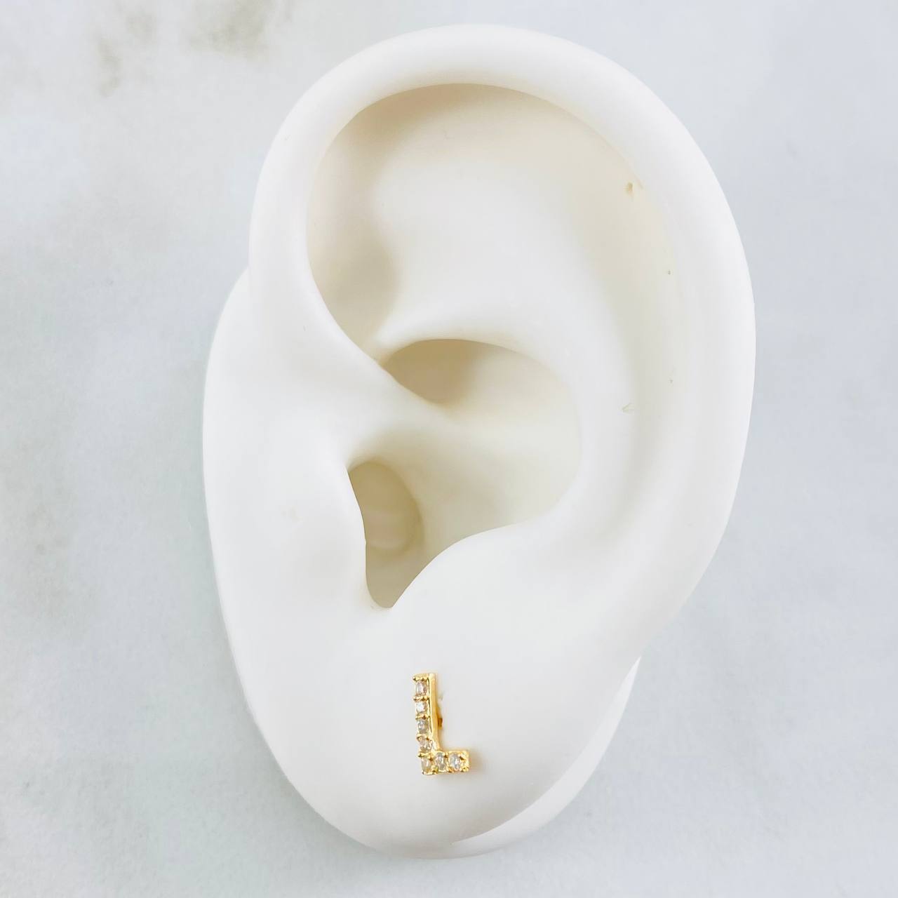 Topos Letra L 0.6gr / Oro Amarillo 18K *