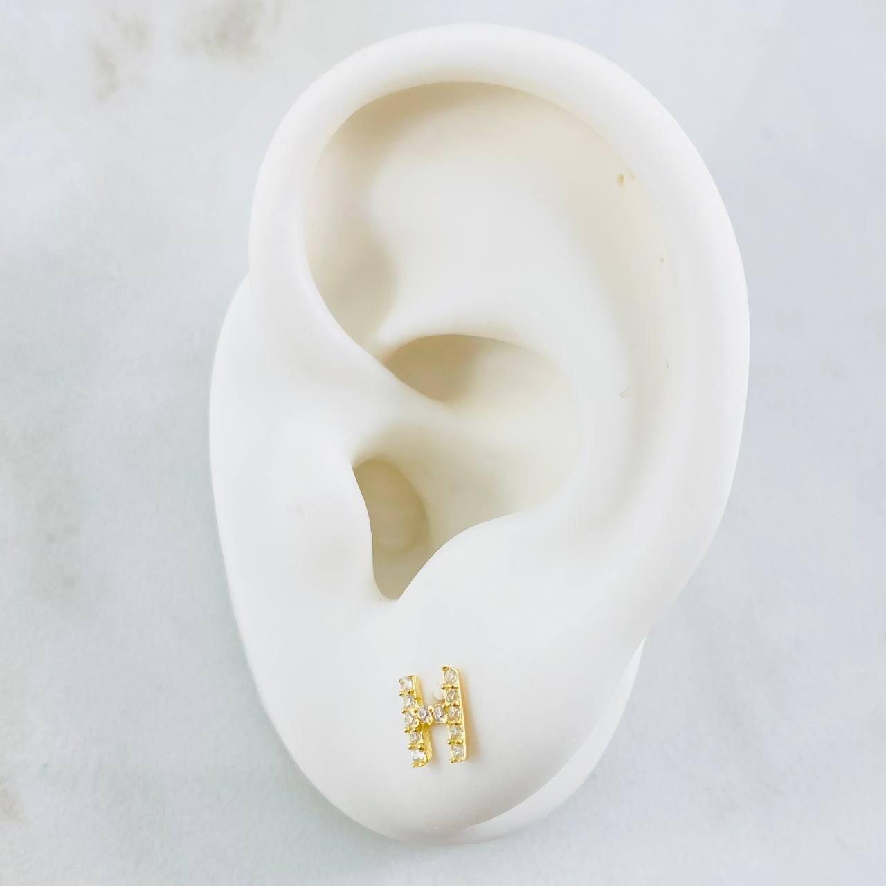Topos Letra H 0.75gr / Oro Amarillo 18K *