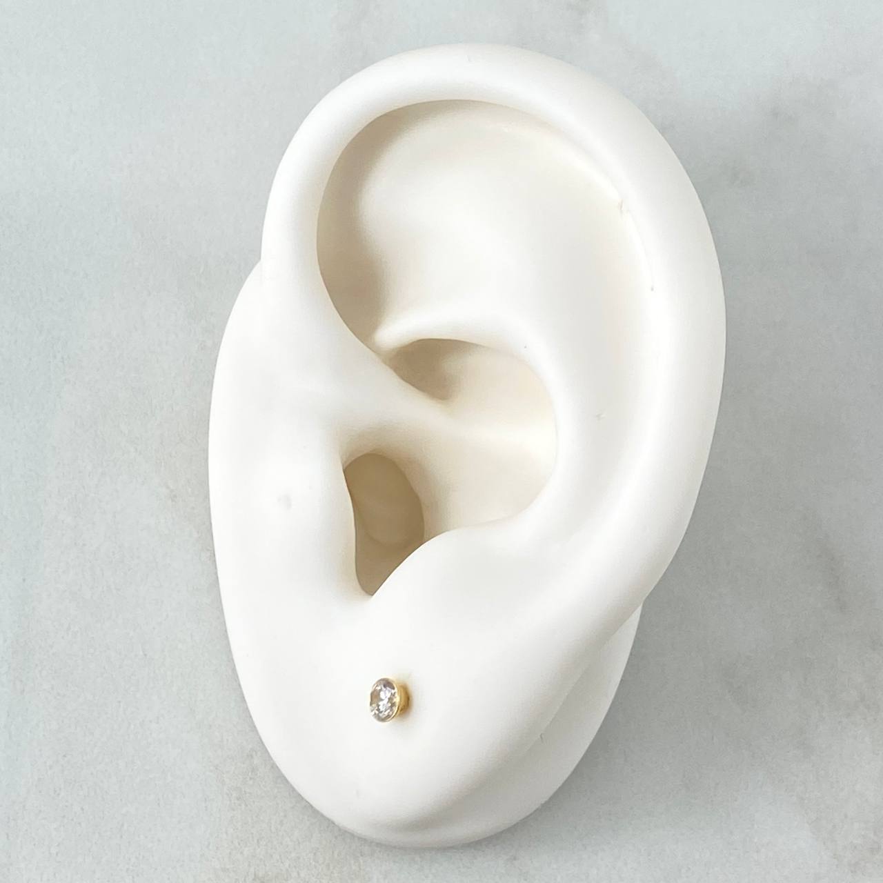 Topos Bisel 0.45gr / 3mm Circones Blancos Oro Amarillo 18K *