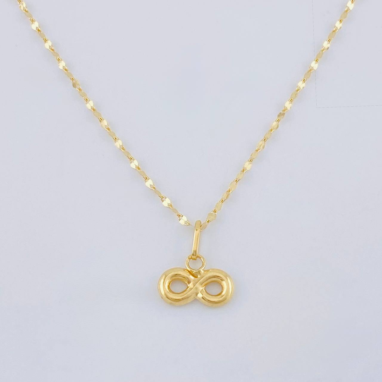 Set Cadena Flor Espejo + Dije Infinito / 1.1gr / 45 cm Oro Amarillo 18K