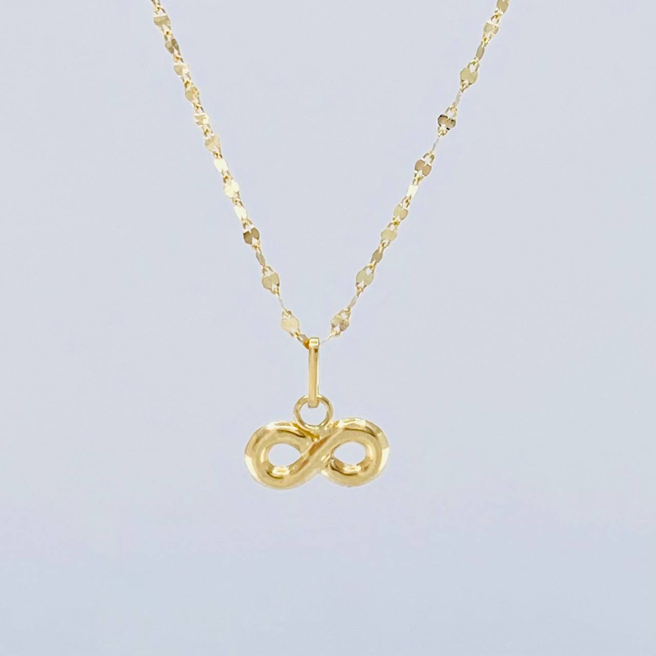 Set Cadena Flor Espejo + Dije Infinito / 1.1gr / 45.1 cm Oro Amarillo 18K