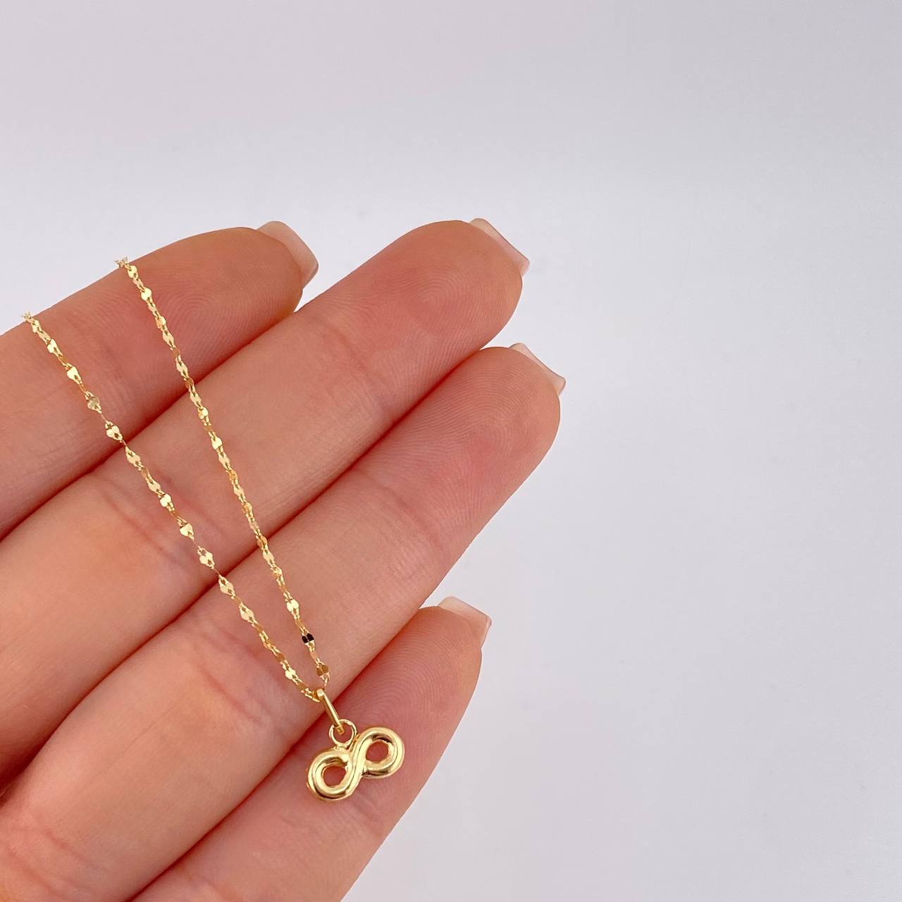 Set Cadena Flor Espejo + Dije Infinito / 1.1gr / 45.2 cm Oro Amarillo 18K