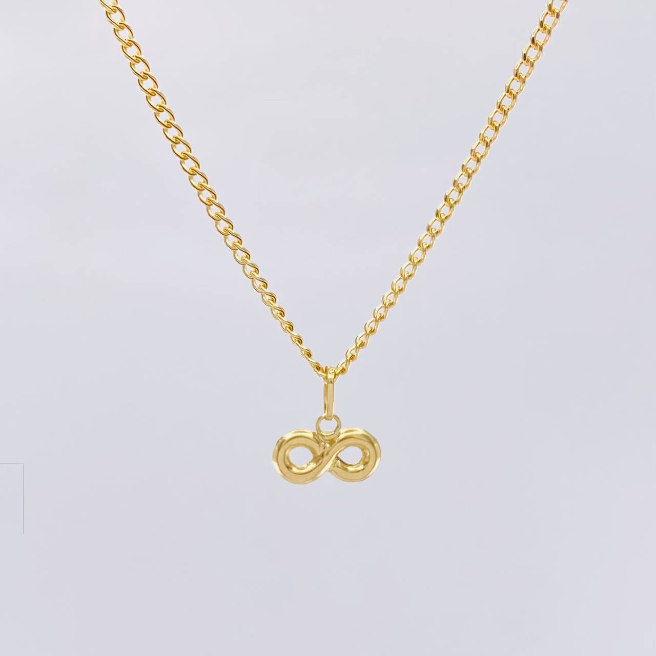 Set Cadena Cubana + Dije Infinito / 1.3gr / 46.2 cm Oro Amarillo 18K