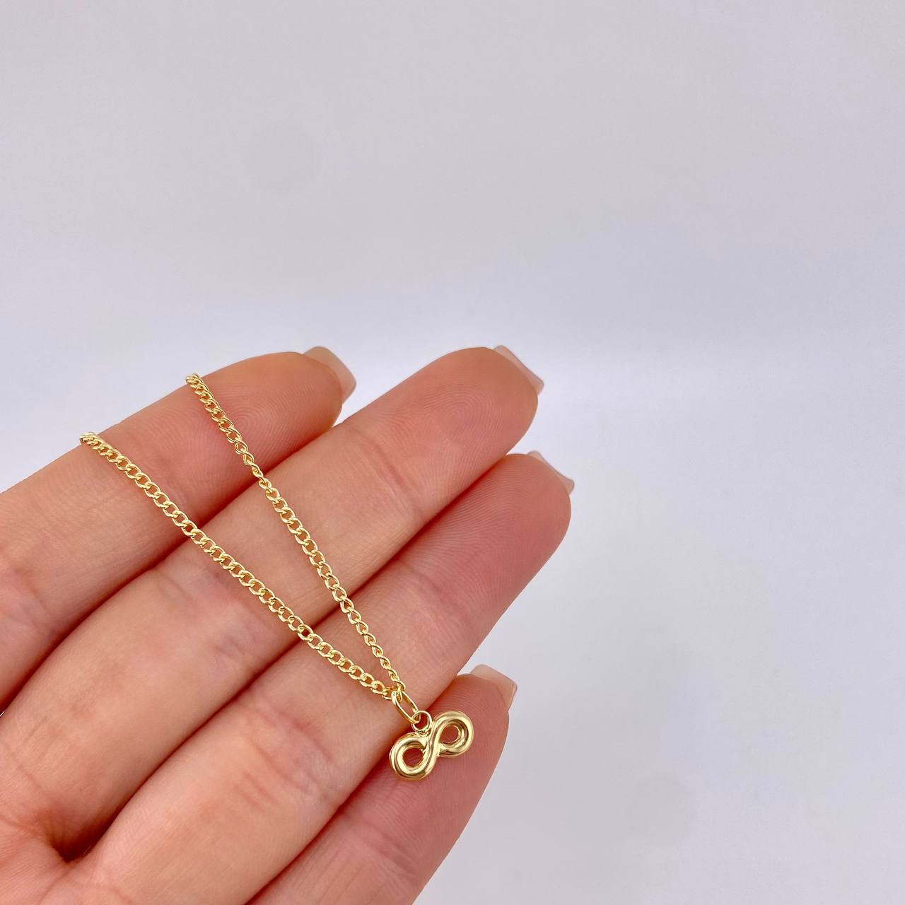 Set Cadena Cubana + Dije Infinito / 1.65gr / 46.2 cm Oro Amarillo 18K