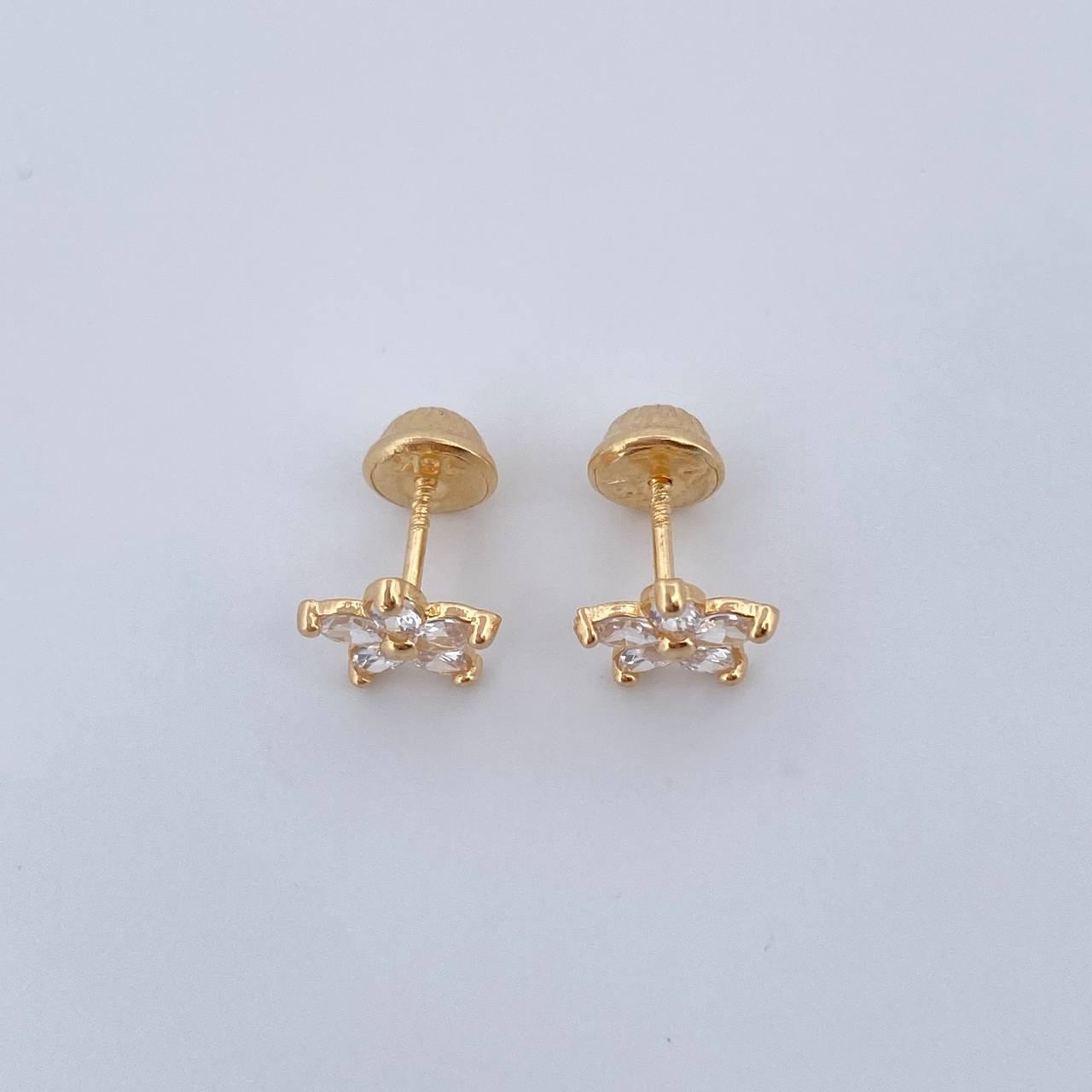 Topos Flor 0.9gr / Circones Blancos Oro Amarillo 18K $