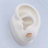Topos Corona 0.85gr / Circones Fucsias Oro Amarillo 18K $