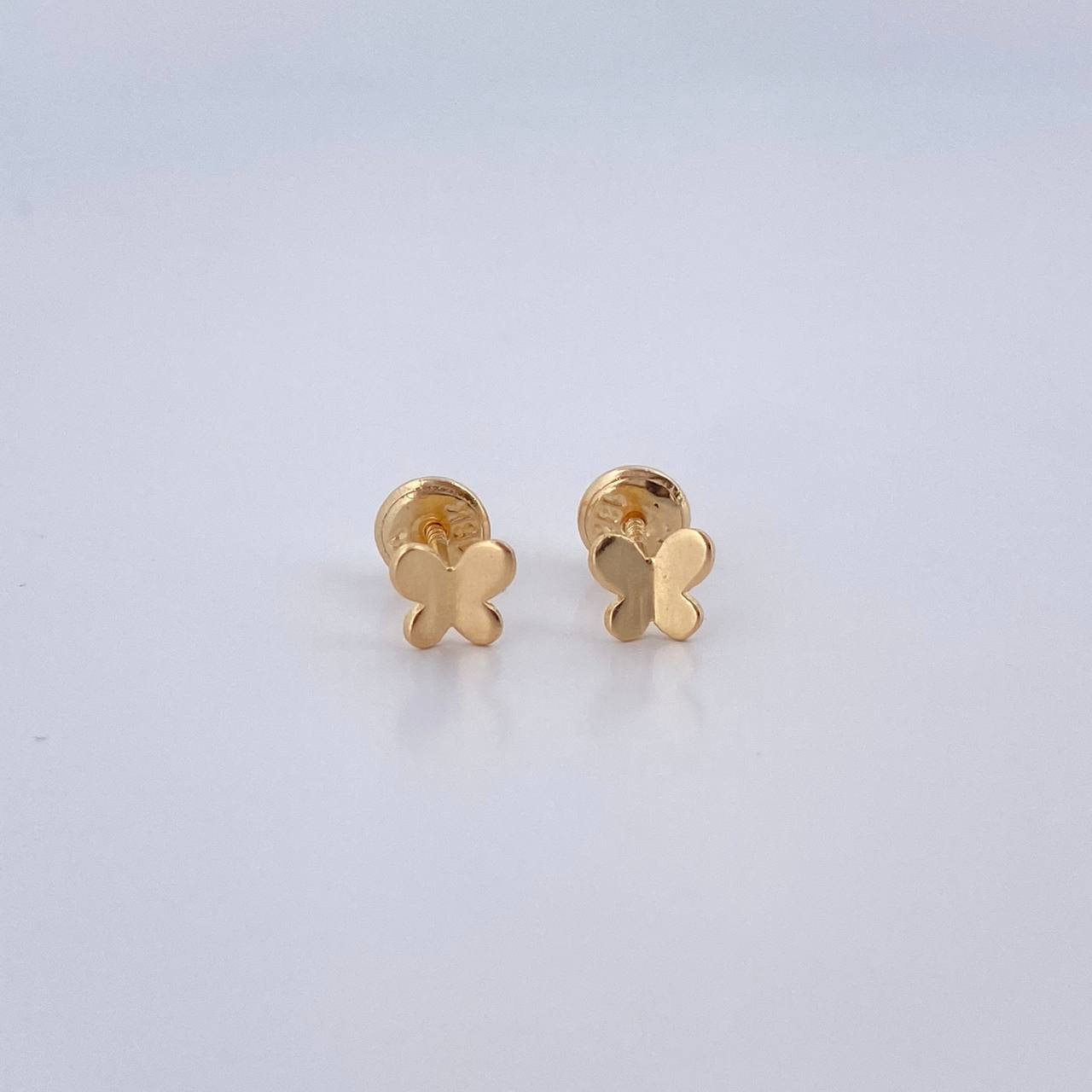 Topos Mariposa 0.65gr / Lisos Oro Amarillo 18K $