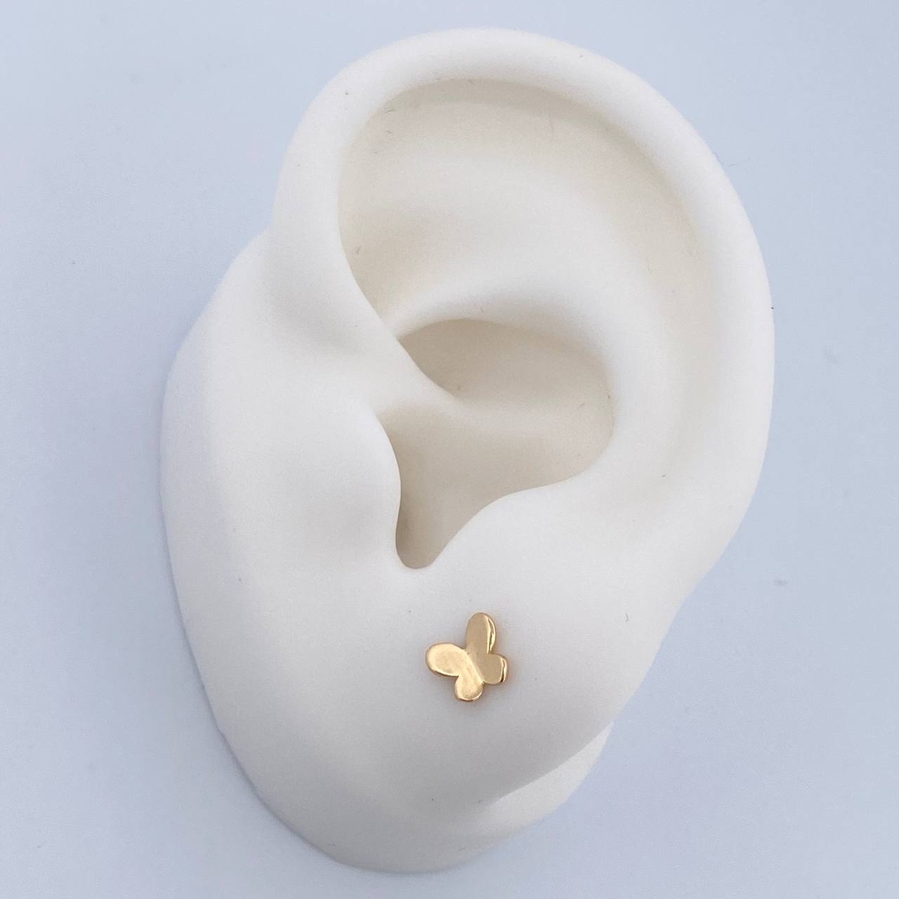 Topos Mariposa 0.65gr / Lisos Oro Amarillo 18K $