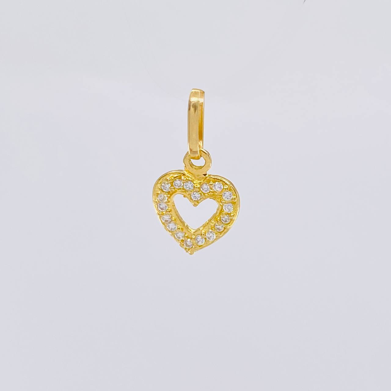 Dije Silueta Corazon Tupida 0.75g / 1.5cm Oro Amarillo 18K