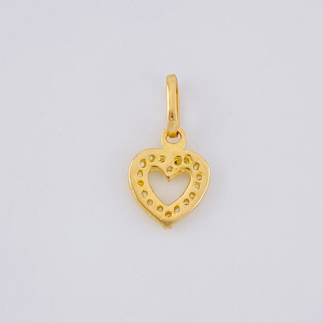 Dije Silueta Corazon Tupida 0.75g / 1.5cm Oro Amarillo 18K