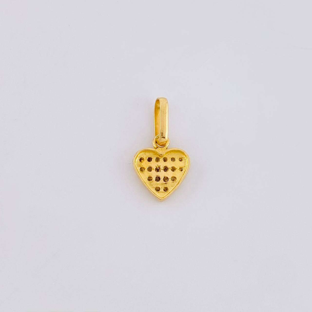 Dije Corazon Tupido 0.95g / 1.2cm Oro Amarillo 18K