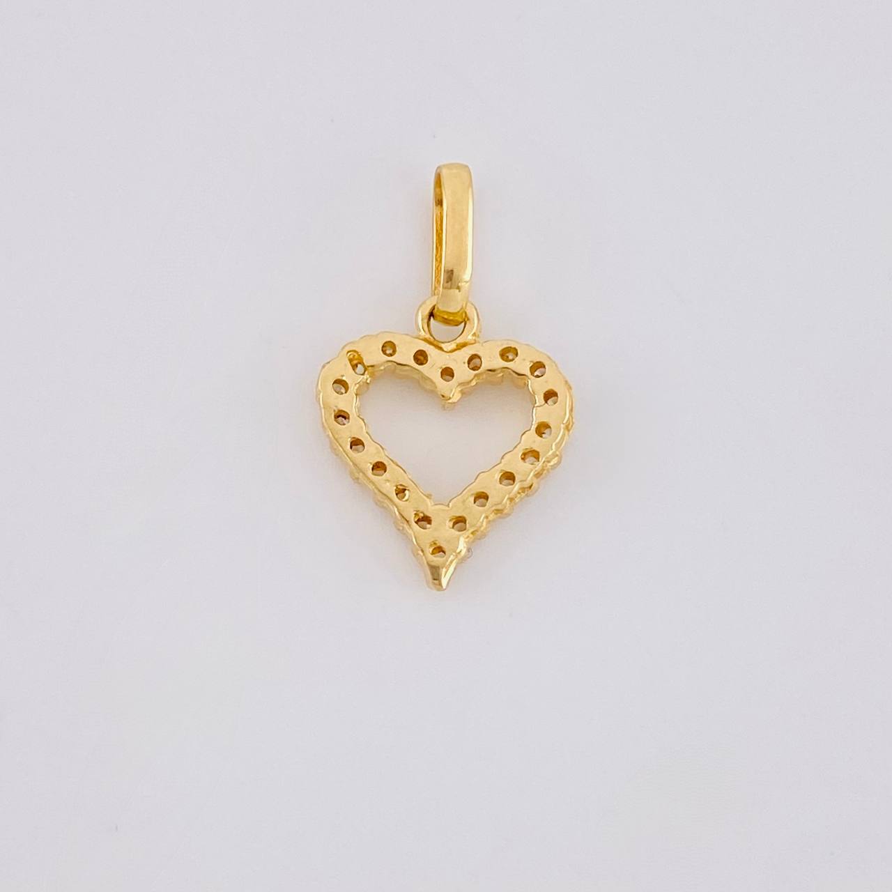 Dije Silueta Corazon Tupida 0.8g / 1.6cm Oro Amarillo 18K