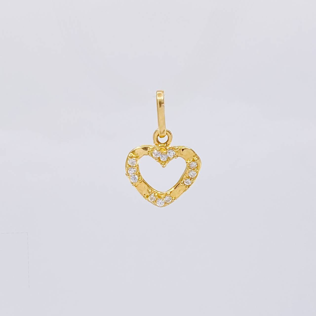 Dije Silueta Corazon Tupido 0.65g / 1.5cm Oro Amarillo 18K