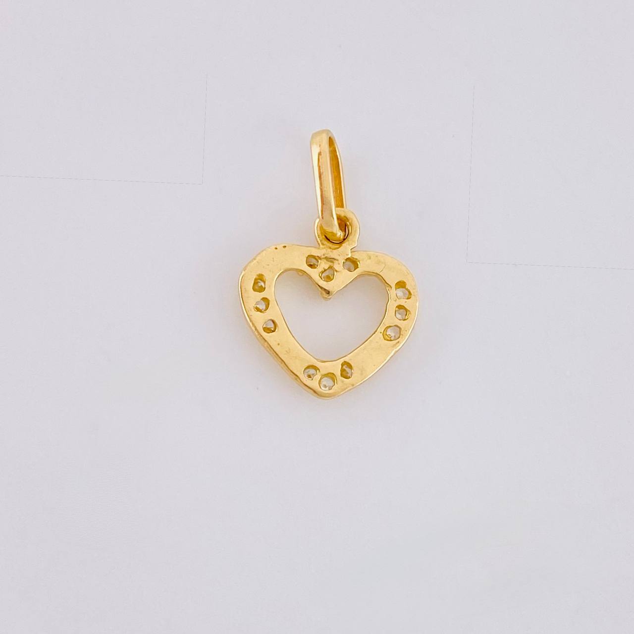 Dije Silueta Corazon Tupido 0.7g / 1.5cm Oro Amarillo 18K