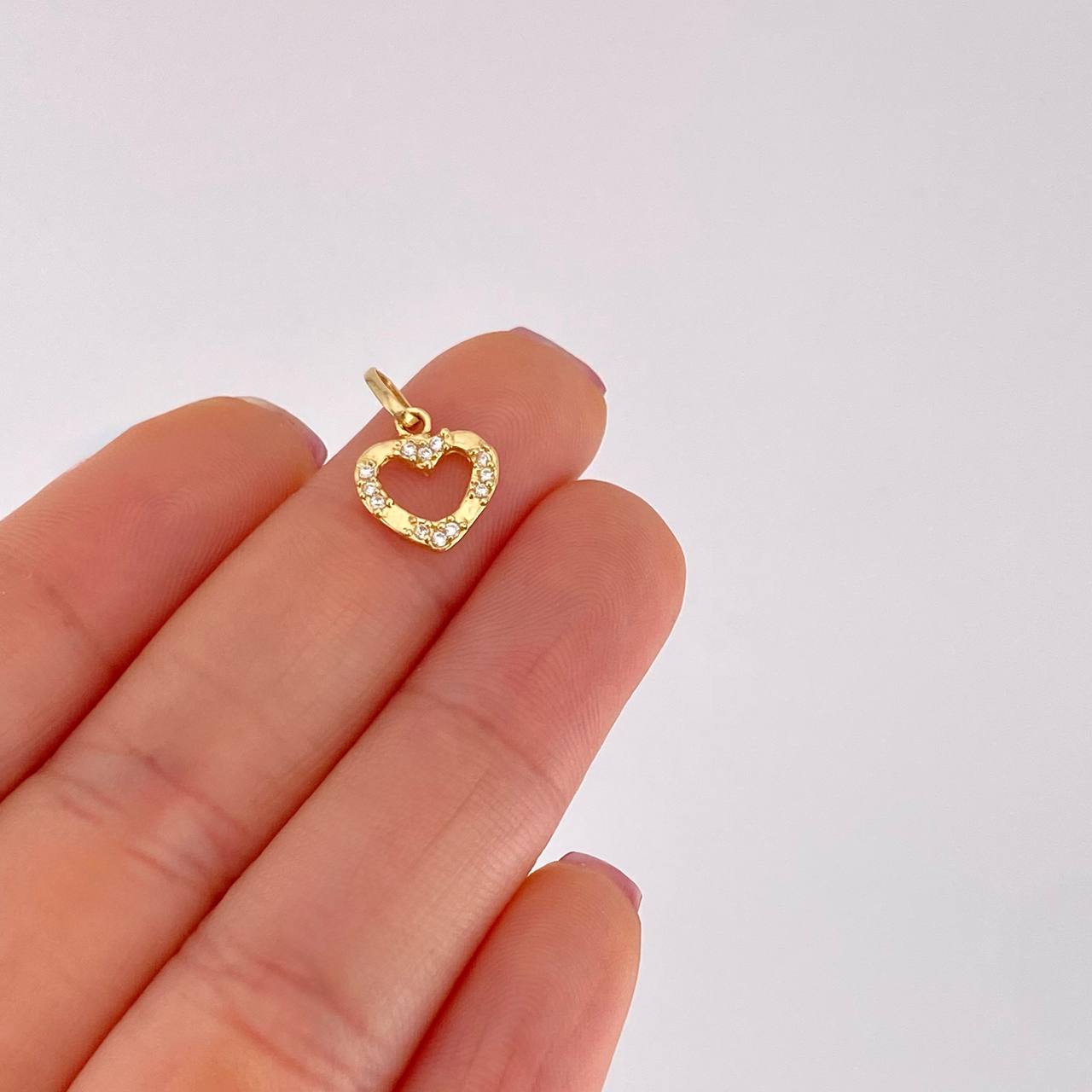 Dije Silueta Corazon Tupido 0.7g / 1.5cm Oro Amarillo 18K