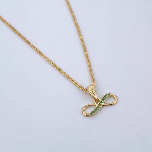 Set Cadena Lazo 0.9gr / 45.1cm / 1mm + Dije Infinito 0.65gr / 1cm Circones Verdes Oro Amarillo 18K (Oferta) $