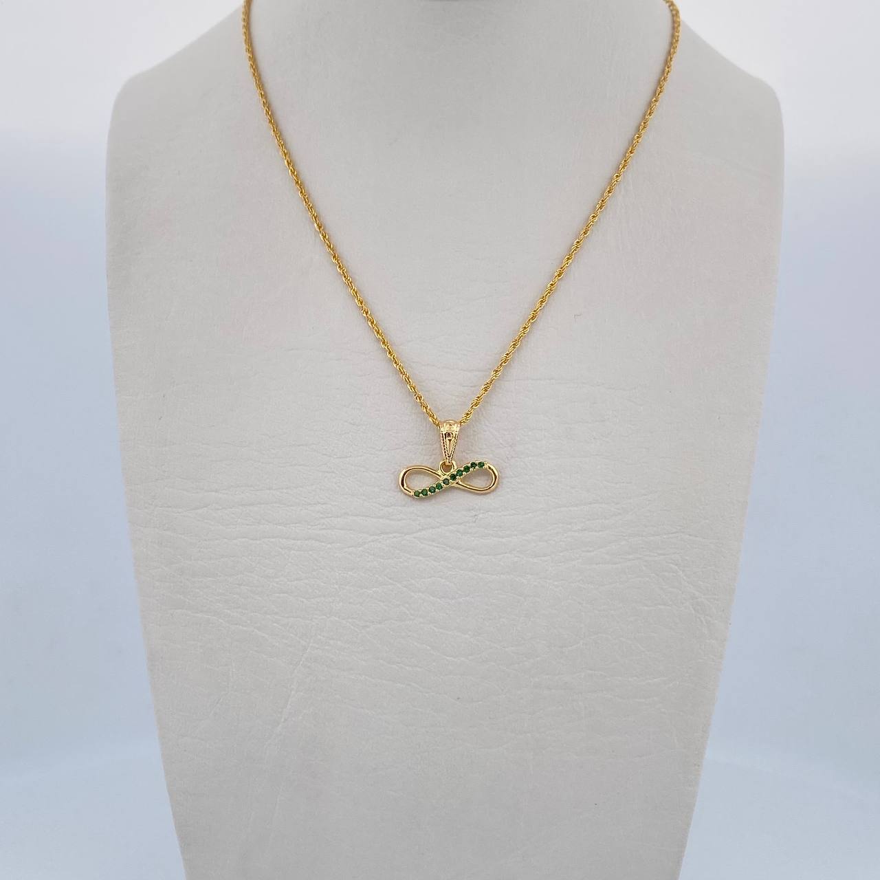 Set Cadena Lazo 0.9gr / 45.1cm / 1mm + Dije Infinito 0.65gr / 1cm Circones Verdes Oro Amarillo 18K (Oferta) $