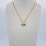 Set Cadena Lazo 0.9gr / 45.1cm / 1mm + Dije Infinito 0.65gr / 1cm Circones Verdes Oro Amarillo 18K (Oferta) $