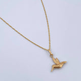 Set Cadena Singapur 1.1gr / 45.1cm / 0.8mm + Dije Colibri 0.5gr / 1.6cm Troquelado Oro Amarillo 18K (Oferta) $