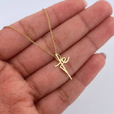 Set Cadena Singapur 1.15gr / 50.1cm / 0.7mm + Dije Cruz Fe 0.55gr / 1.6cm Liso Oro Amarillo 18K (Oferta) $