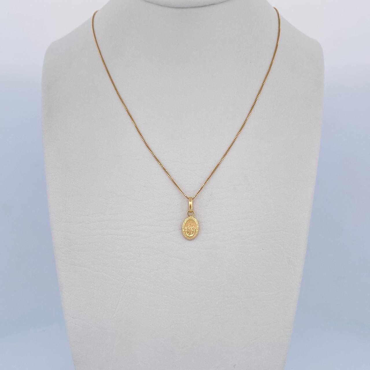 Set Cadena Veneciana 1.35gr/50.1cm/0.6mm + Dije Virgen Milagrosa 0.35gr/1.4cm Troquelado Oro Amarillo 18K (Oferta) $