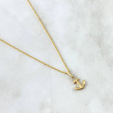 Set Cadena Lazo 1gr / 50cm / 1.2mm + Dije Ancla 0.45gr / 1.7cm Oro Amarillo 18K