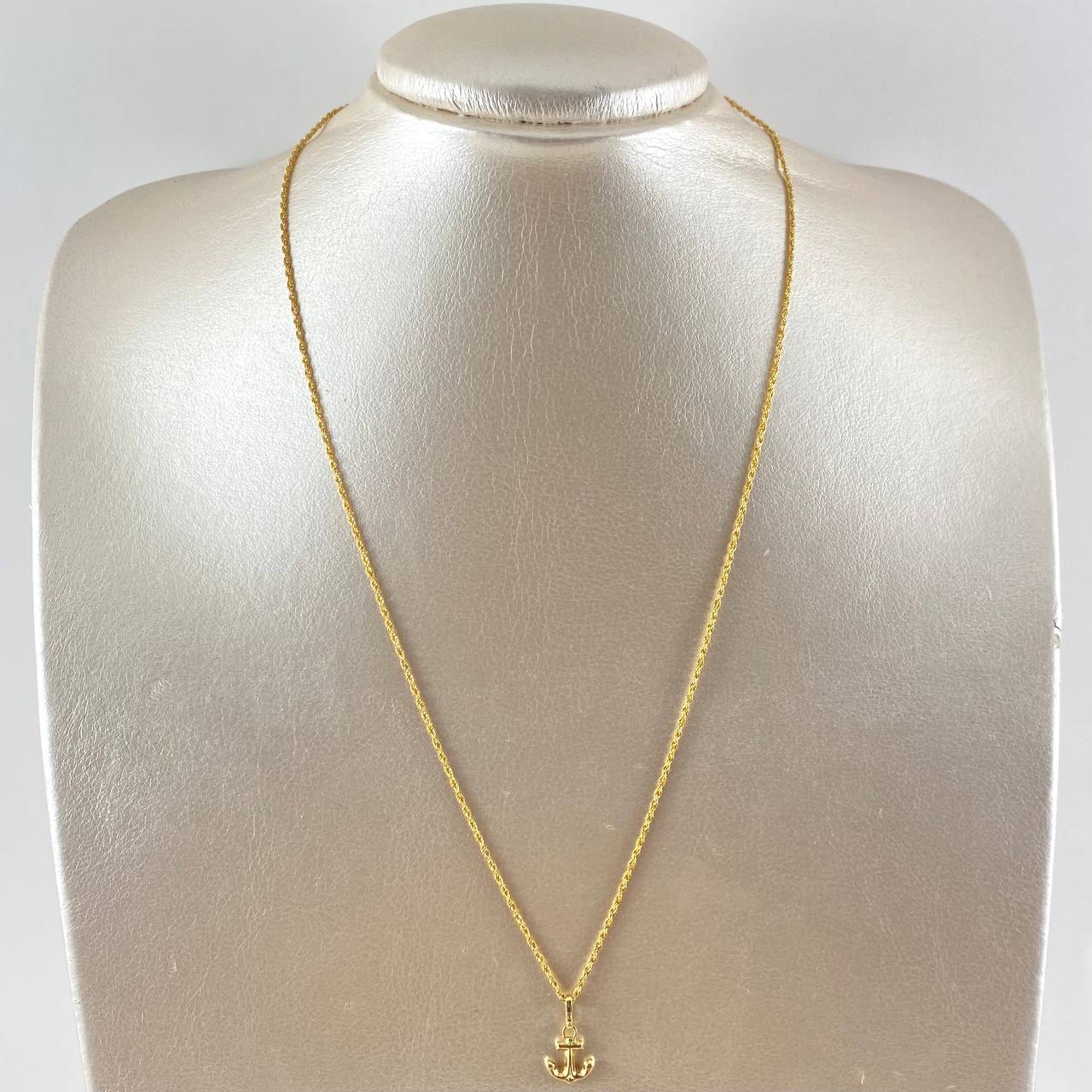Set Cadena Lazo 1gr / 50cm / 1.2mm + Dije Ancla 0.45gr / 1.7cm Oro Amarillo 18K