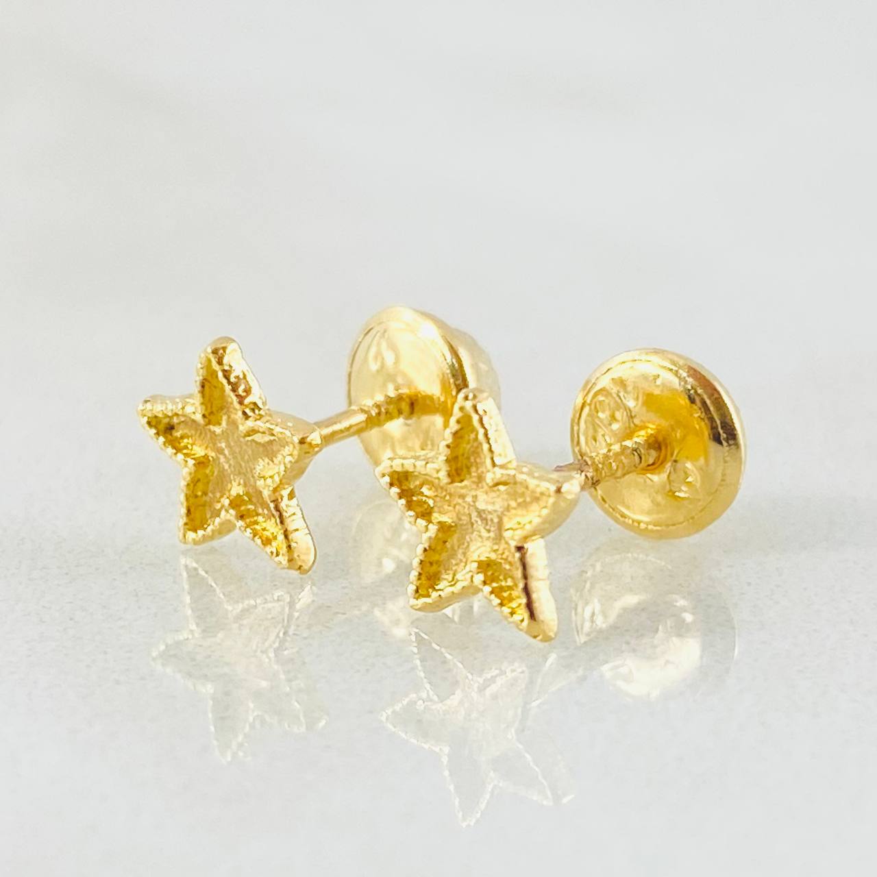 Topos Estrella Bordeada 0.75gr / Oro Amarillo 18K