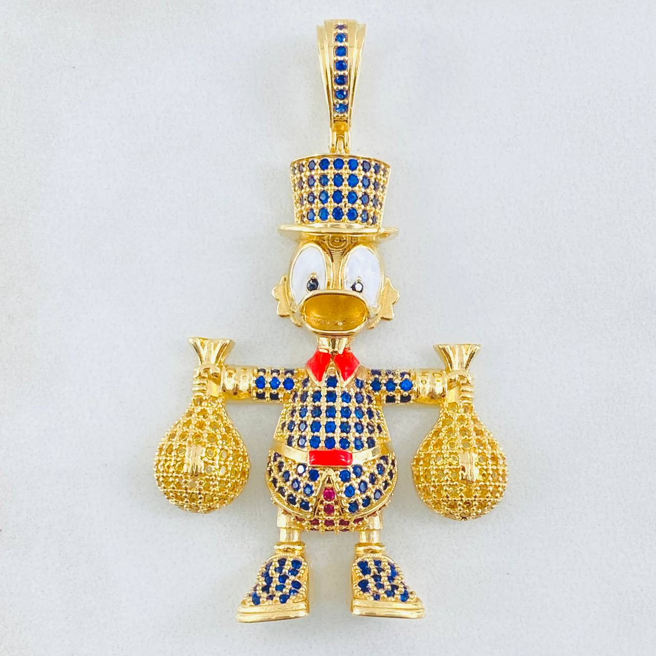 Dije Pato Bolsas Dinero 13.15gr / 5.5cm / Oro Amarillo 18K ©