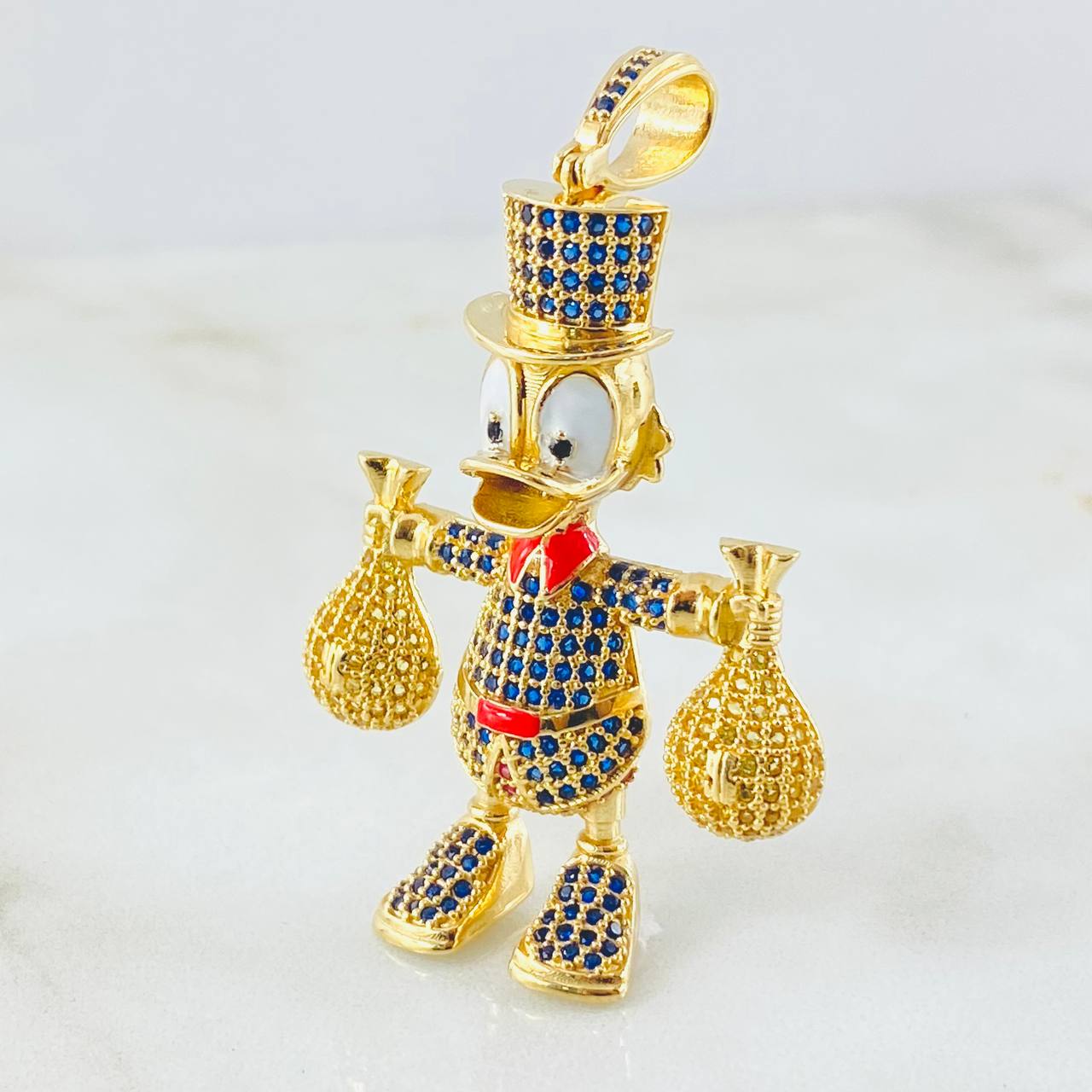 Dije Pato Bolsas Dinero 13.15gr / 5.5cm / Oro Amarillo 18K ©