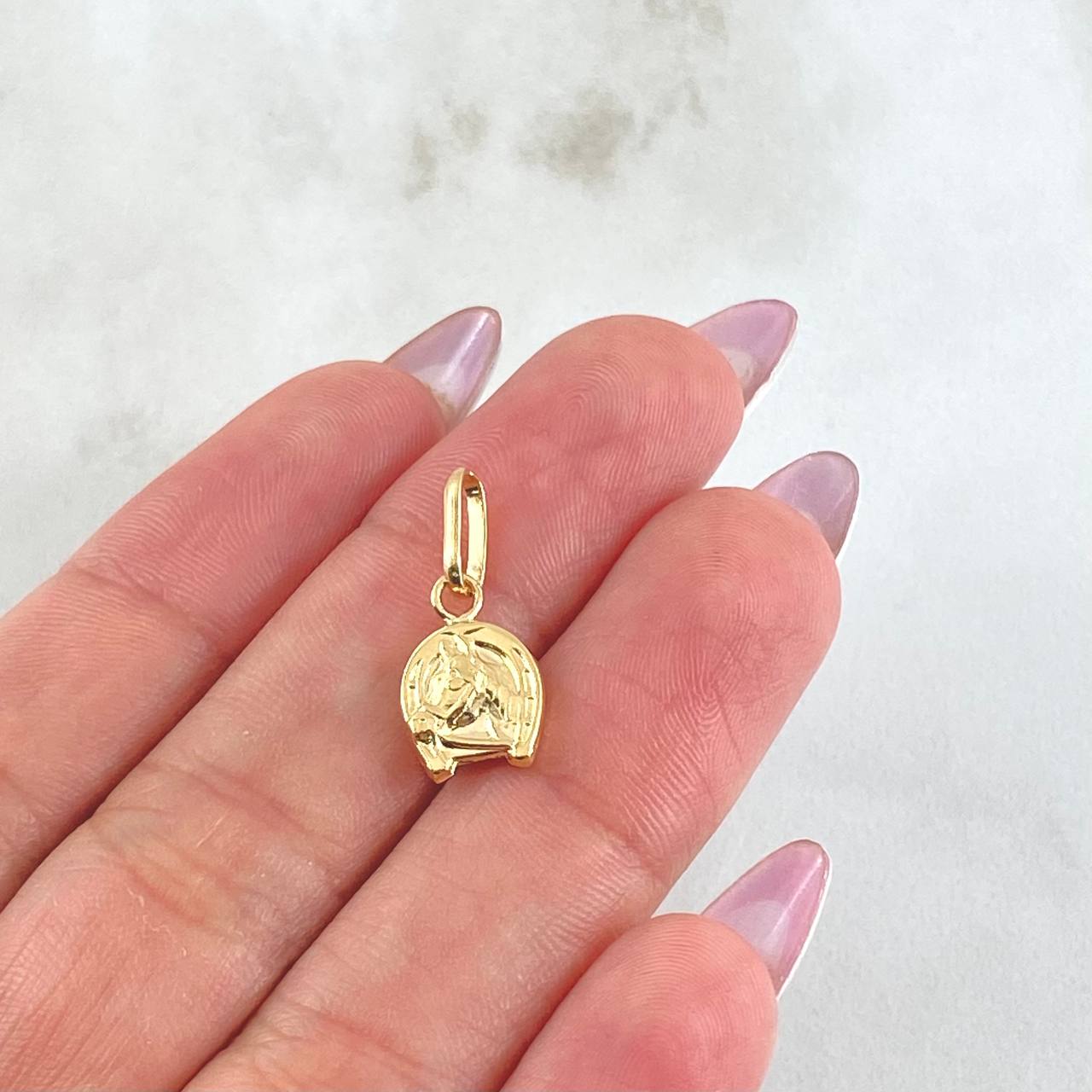 Dije Herradura Caballo 0.65gr / 1.9cm / Oro Amarillo 18K ©