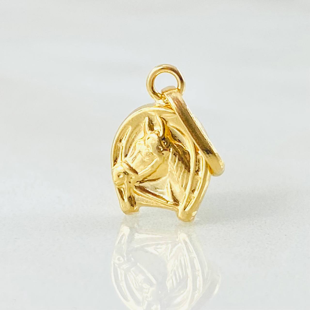 Dije Herradura Caballo 0.65gr / 1.9cm / Oro Amarillo 18K ©