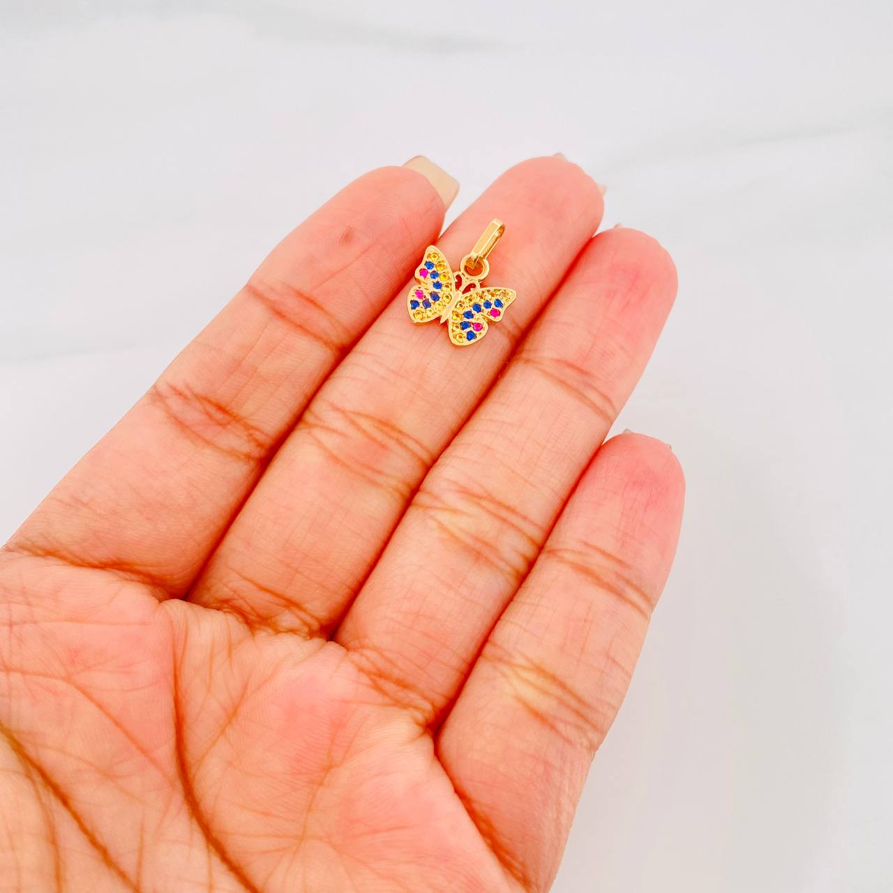 Dije Mariposa 1.2g / 1.6cm Oro Amarillo 18K