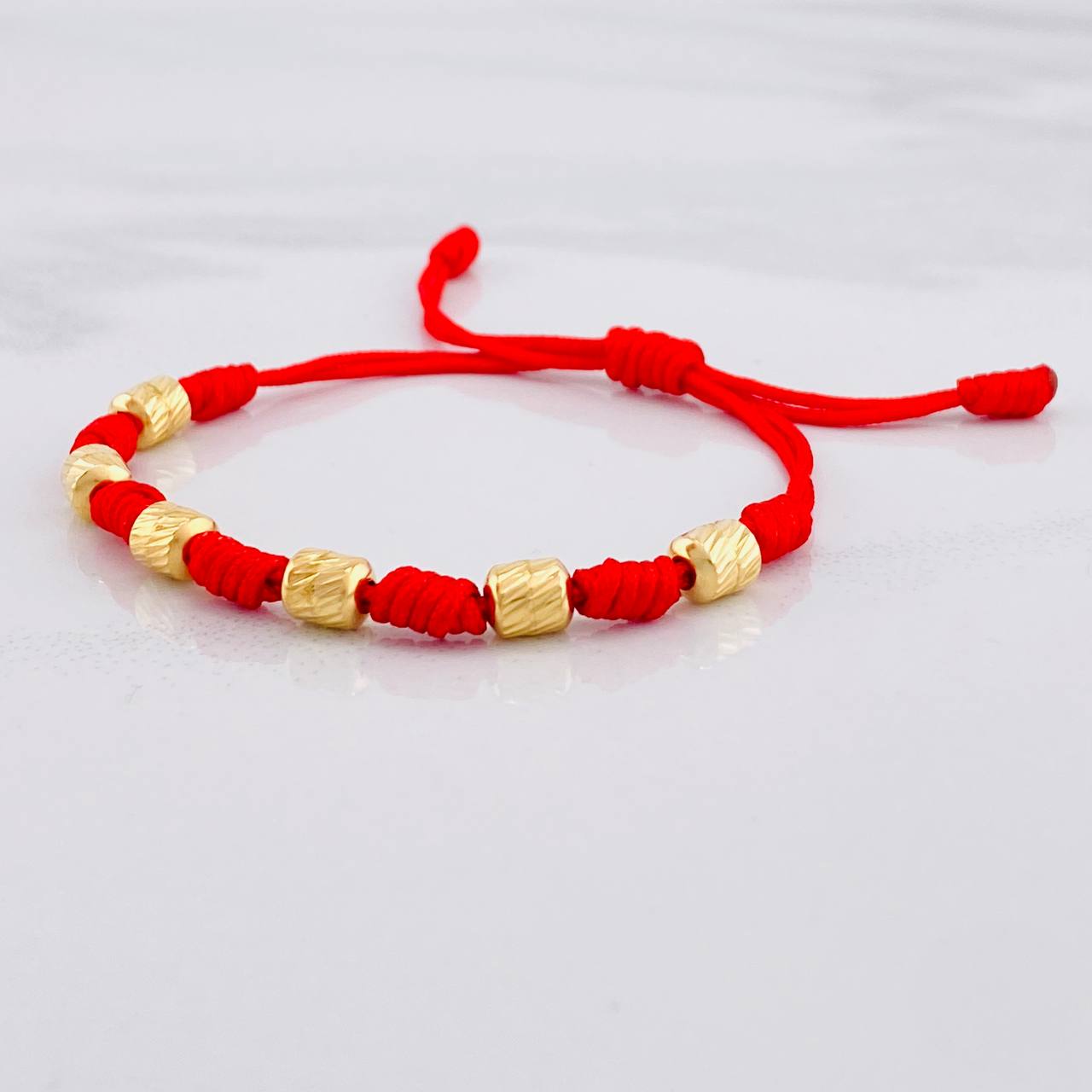 Pulsera Tejida Roja 7 Nudos 6 Cilindros Diamantado Oro Amarillo 18K