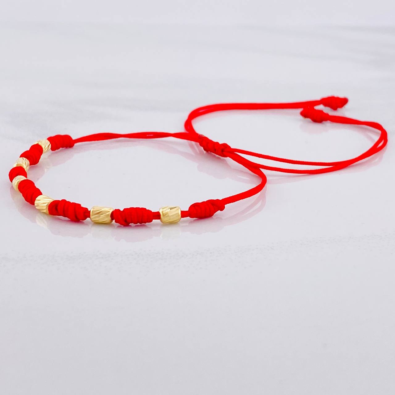 Pulsera Tejida Roja Siete Nudos Oro Amarillo 18K