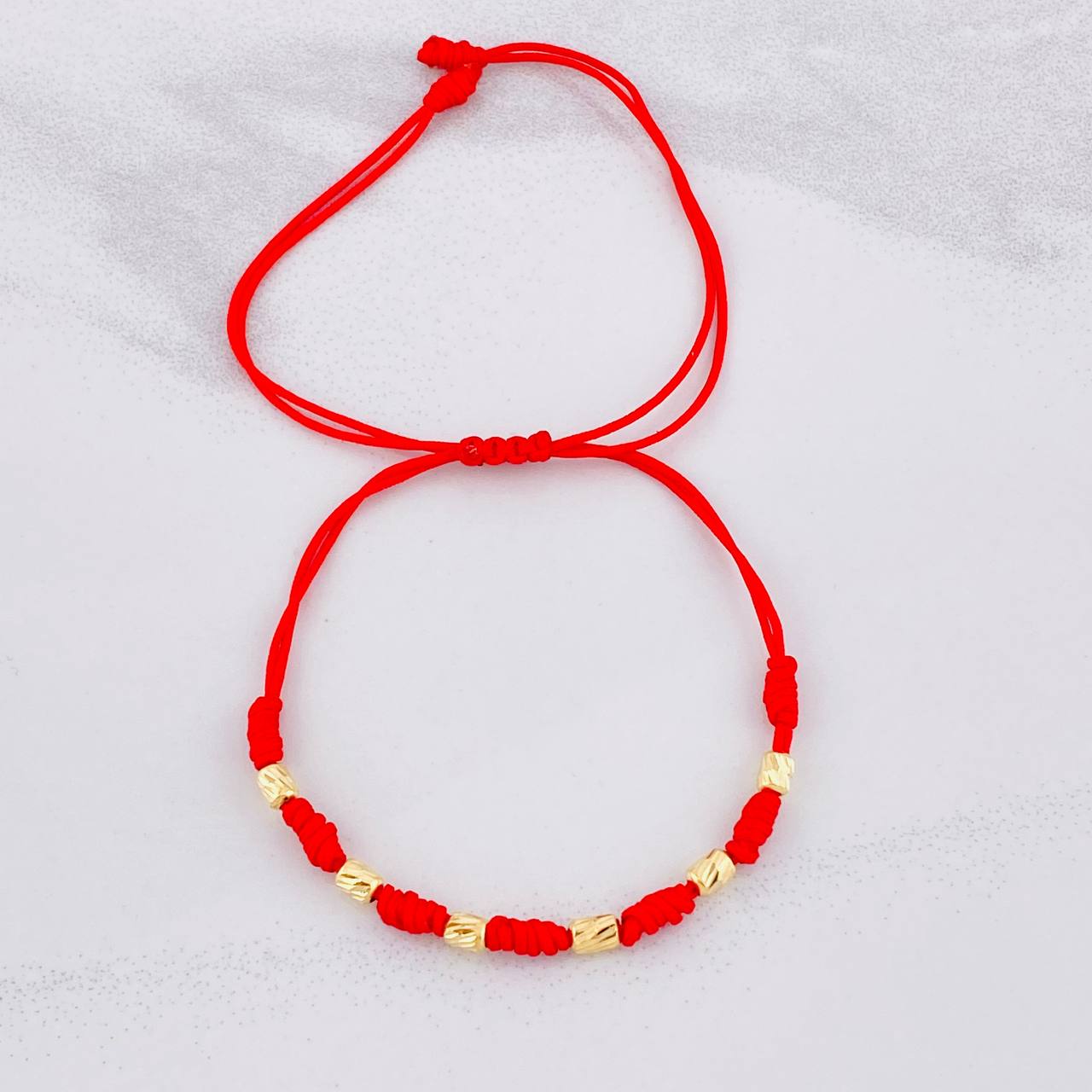 Pulsera Tejida Roja Siete Nudos Oro Amarillo 18K