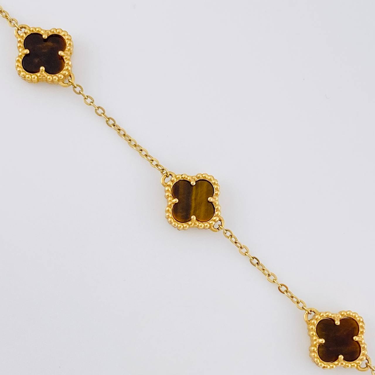 Pulso Aro Seguido Trebol VCyA Punteado 4.45gr / 16cm-19cm / 1.5mm Graduable Cuarzo Ojo de Tigre Oro Amarillo 18K
