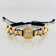 Pulsera Tejida Negra Medalla Cristo Tres Oros 18K