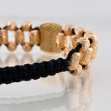 Pulsera Tejida Negra Cruz Cristo Milagroso de Buga Tres Oros 18K