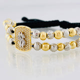 Pulsera Tejida Negra Signo Peso Dos Oros Amarillo Blanco 18K