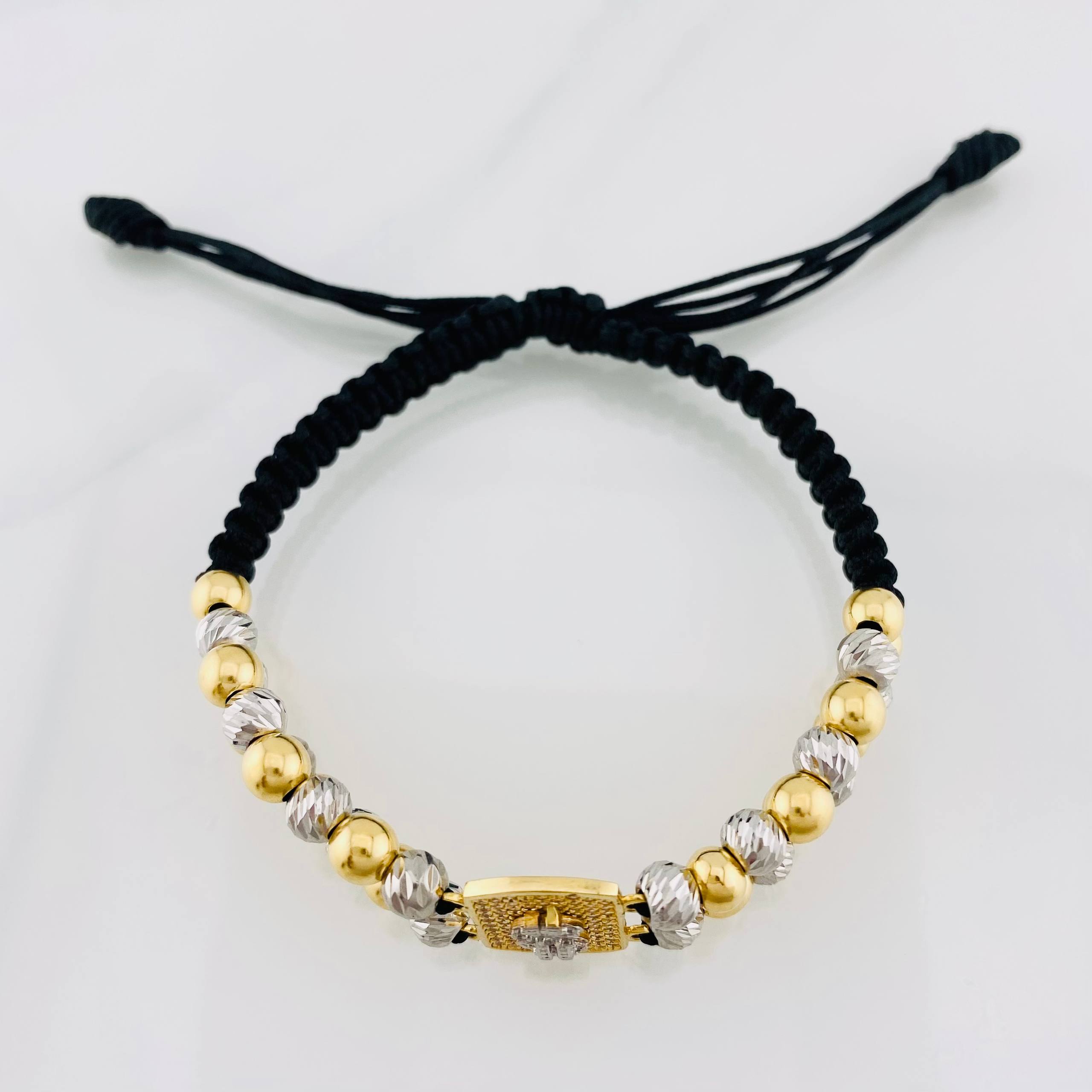Pulsera Tejida Negra Signo Peso Dos Oros Amarillo Blanco 18K