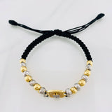 Pulsera Tejida Negra Signo Peso Dos Oros Amarillo Blanco 18K