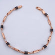 Pulso Rustico Barril 3.75gr / 21cm / 3.8mm Cauchos Negros Oro Rosa 18K $