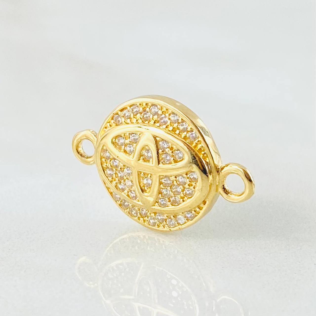 Herraje Marca Automovil 2.15gr / 2cm / Oro Amarillo 18K