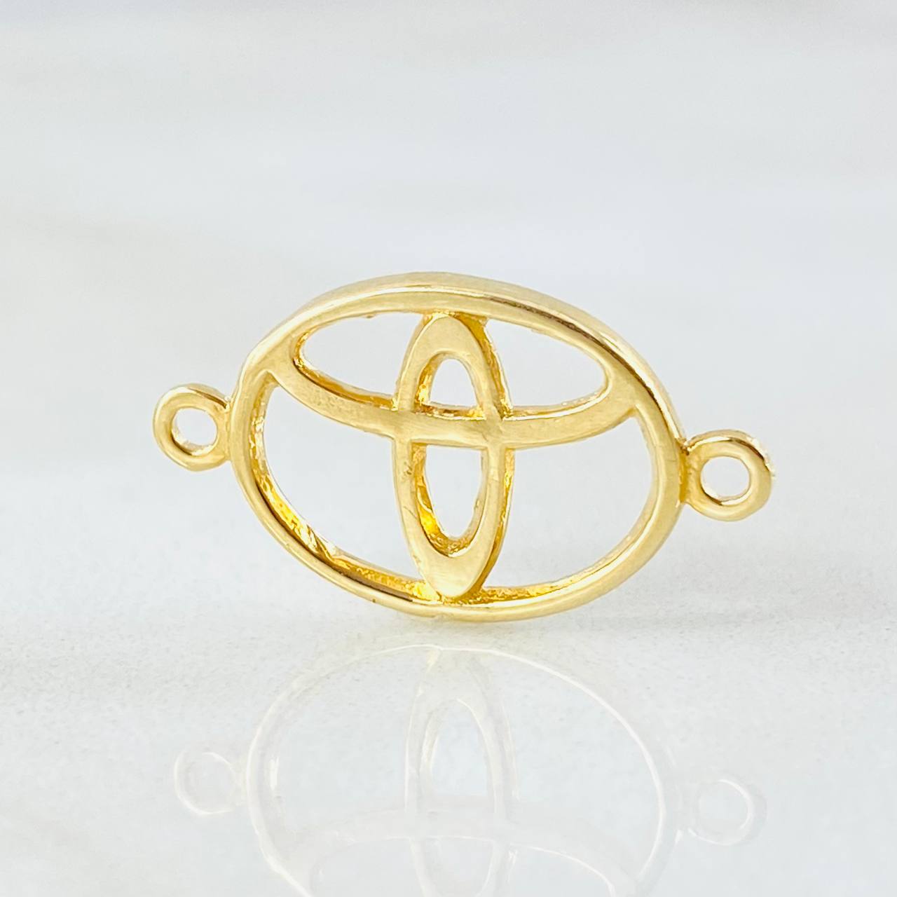 Herraje Marca Automovil 1gr / 2cm / Oro Amarillo 18K ©